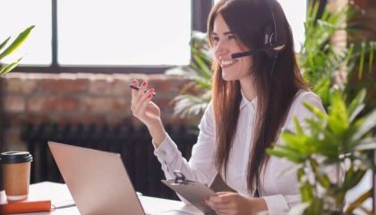 Woman working in call center as dispatcher